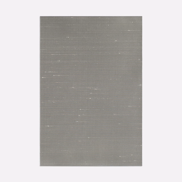 Cool metallic grey fabric with fine horizontal ribbing and scattered pale reflective flecks
