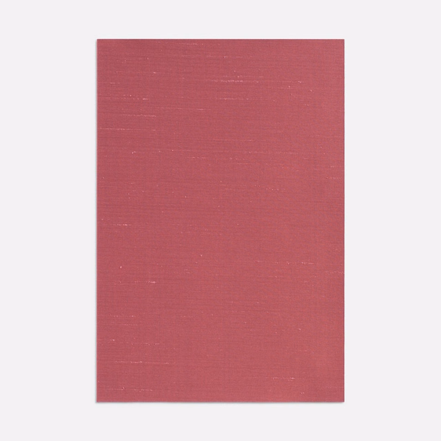 Muted raspberry-pink woven swatch with fine horizontal slubs and a matte glow