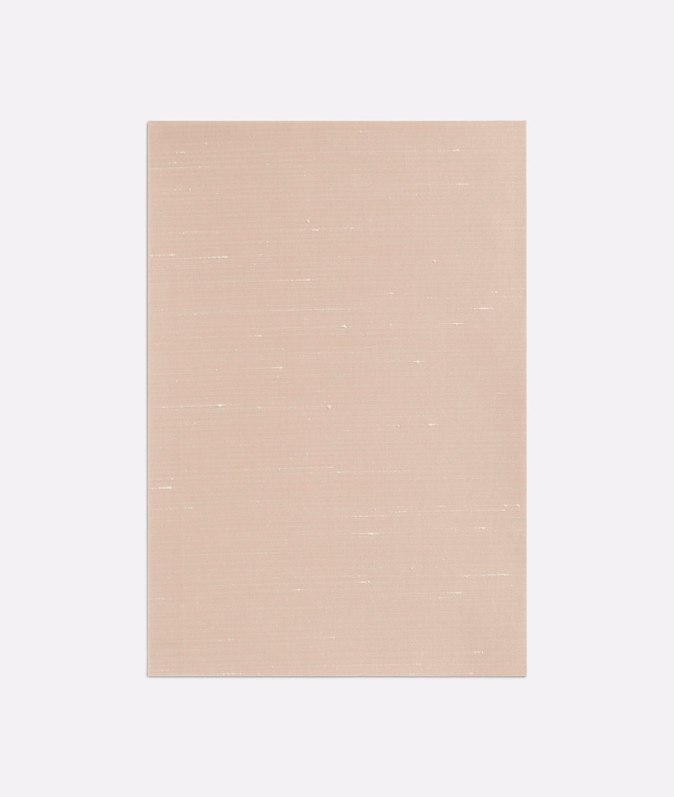 Pale dusty rose fabric with fine horizontal weave and subtle light flecks