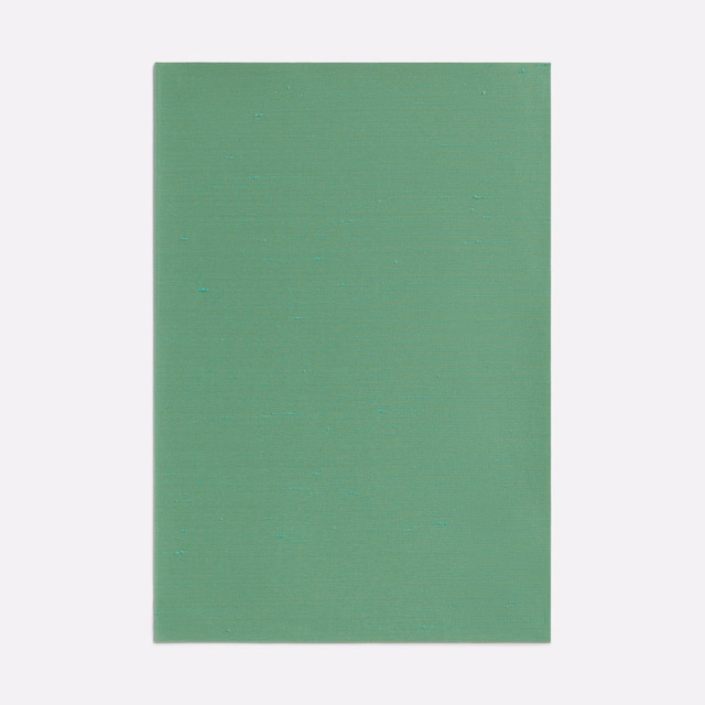 Emerald green textile swatch with a fine, subtly horizontal woven texture
