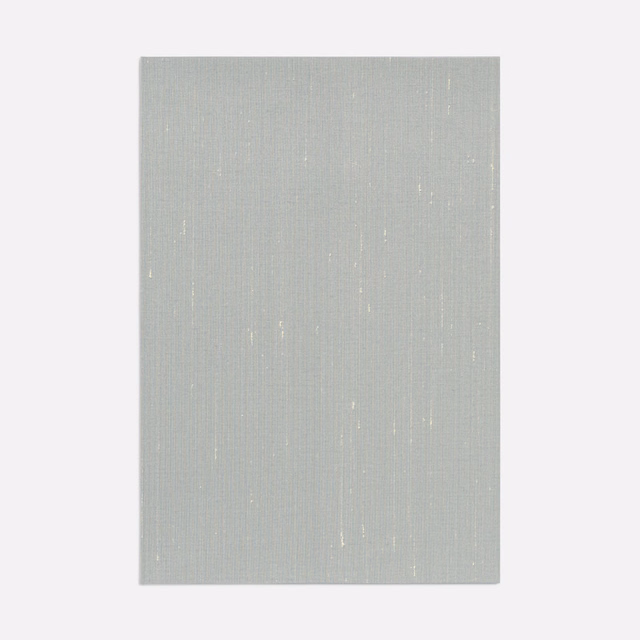 Pale silver-grey woven swatch with fine vertical lines and scattered white flecks