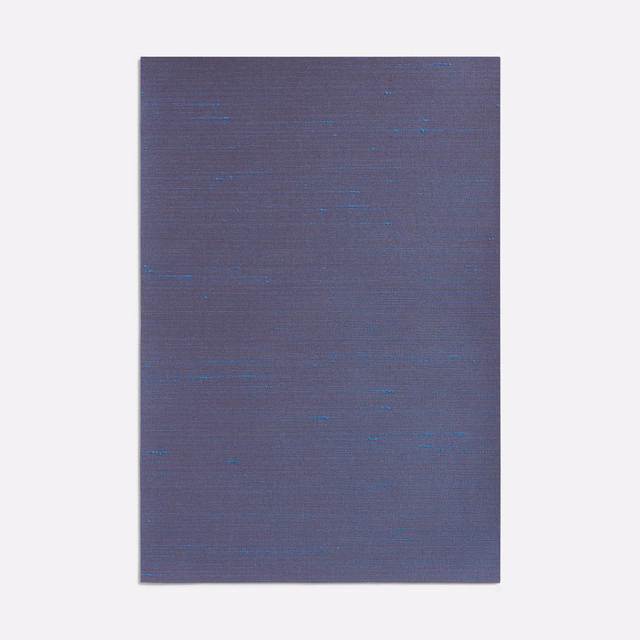 Muted violet woven swatch with fine horizontal lines and scattered blue glints