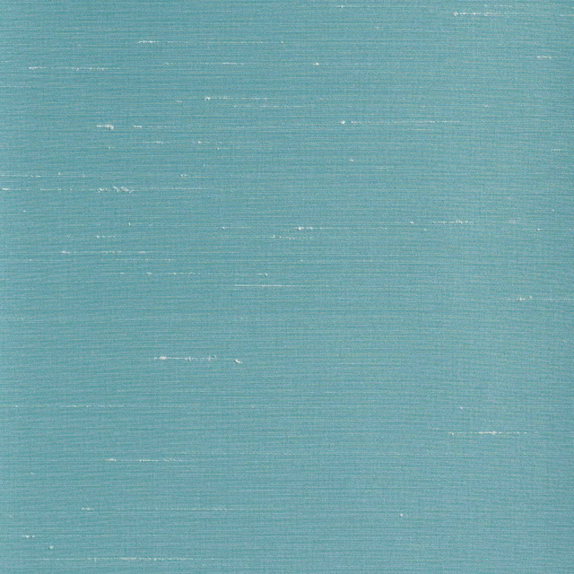 Muted Curaçao teal fabric with fine horizontal slubs and subtle pale flecks