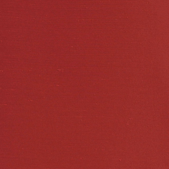 Deep geranium-red textile swatch showing a subtle, even woven grain