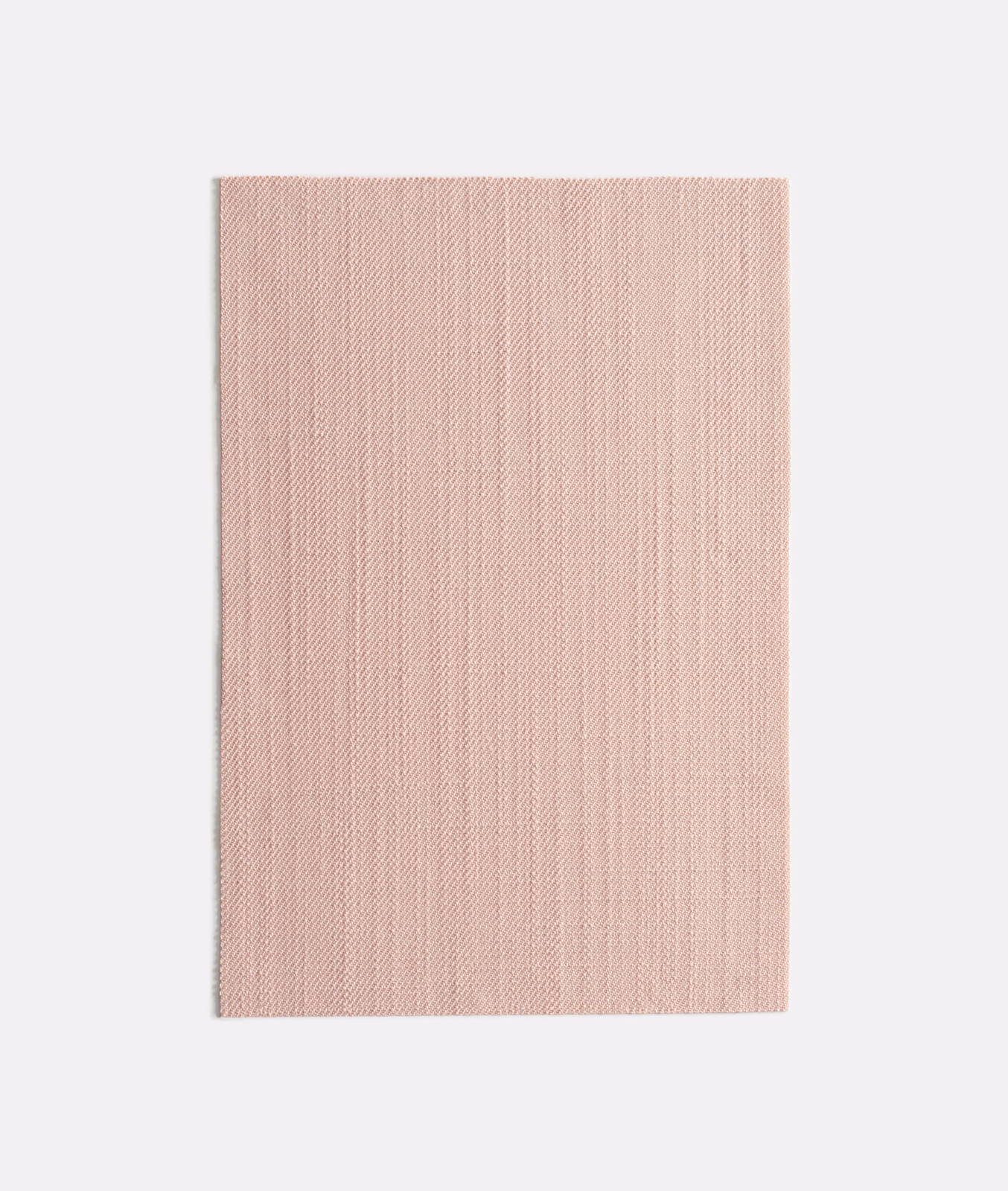 Pale blush-pink fabric swatch with fine vertical woven texture