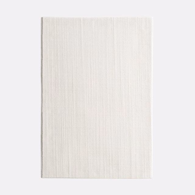 Soft ivory fabric swatch with fine vertical striations and a lightly textured weave