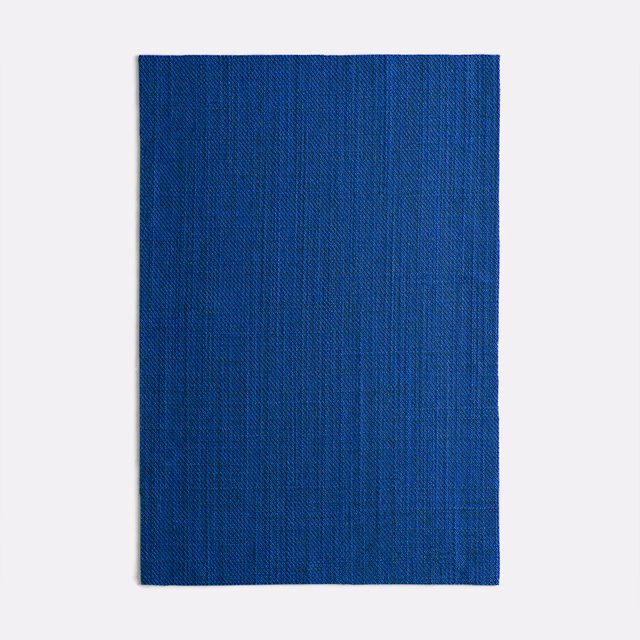 Saturated cobalt blue woven fabric swatch with fine vertical striations and subtle texture