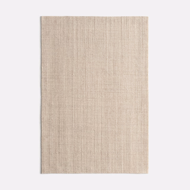 Pale warm-greige woven swatch with fine irregular vertical texture
