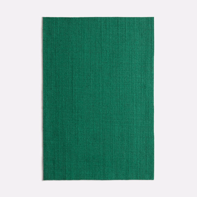 Deep malachite green woven fabric with subtle vertical striations and fine texture
