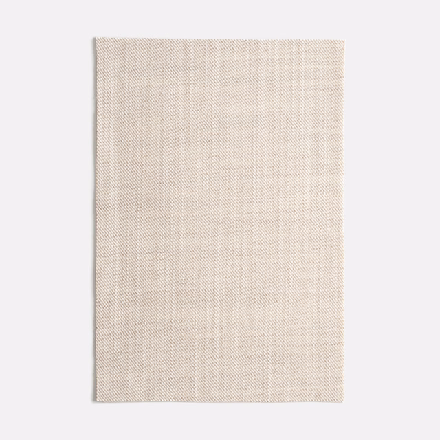 Pale mastice woven fabric with fine vertical lines and subtle chevron texture