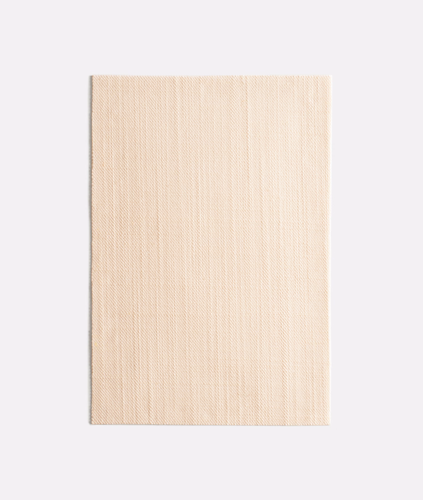 Warm ivory-beige woven swatch with subtle vertical striations and fine tactile grain