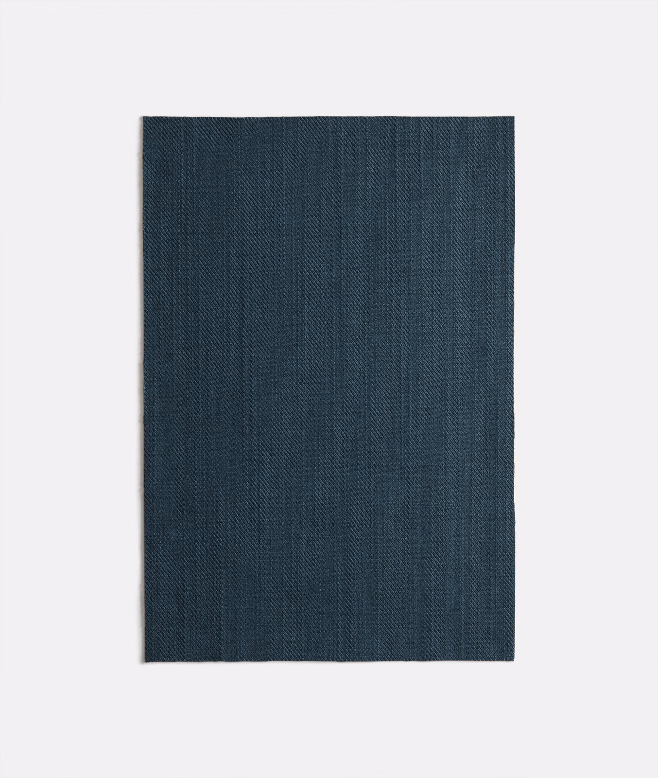 Inky blue charcoal fabric swatch with subtle vertical woven striations