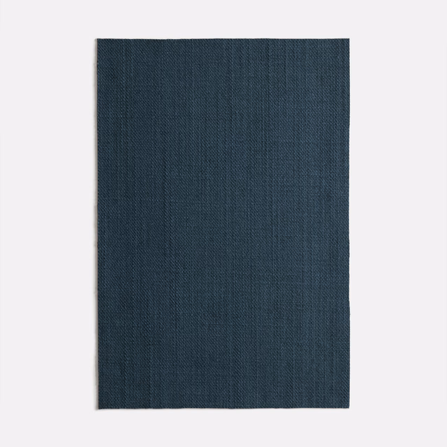 Inky blue charcoal fabric swatch with subtle vertical woven striations