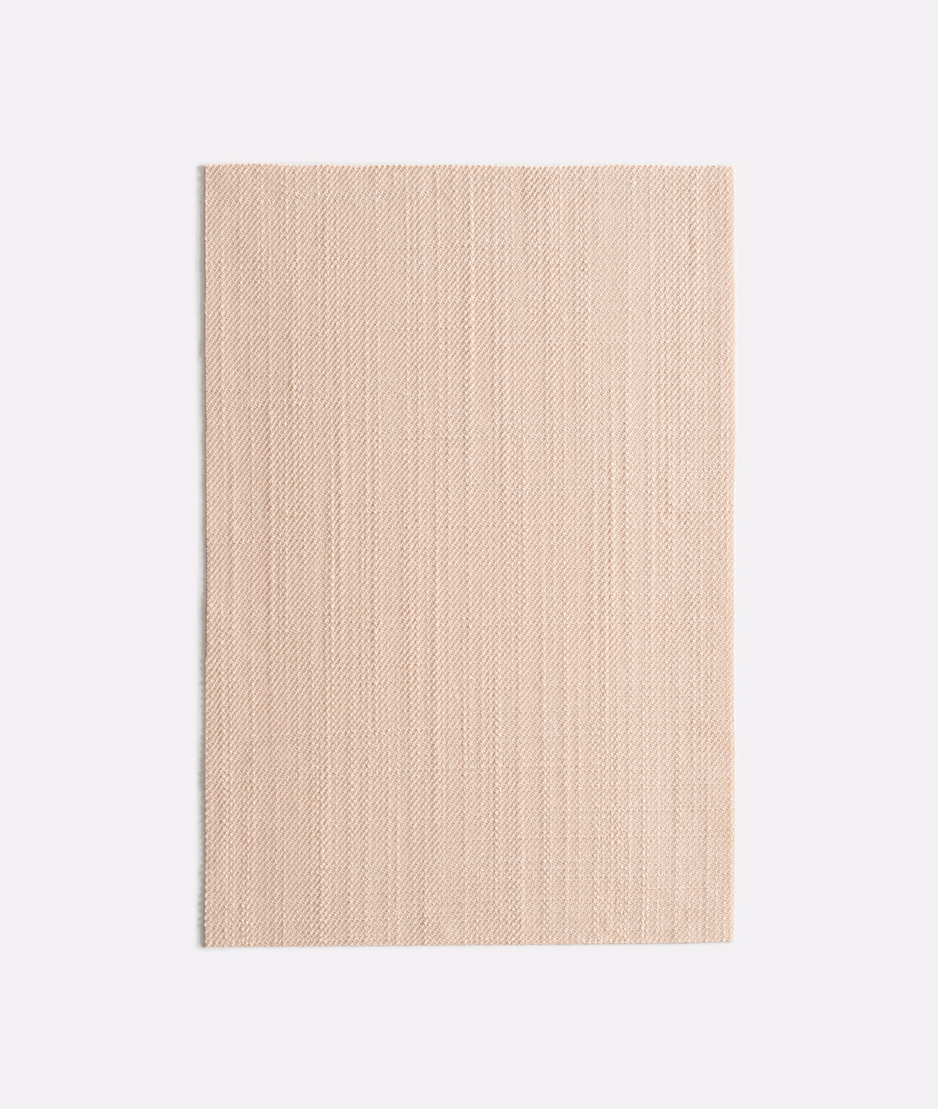 Pale powder-rose fabric with a fine, subtly ribbed vertical weave