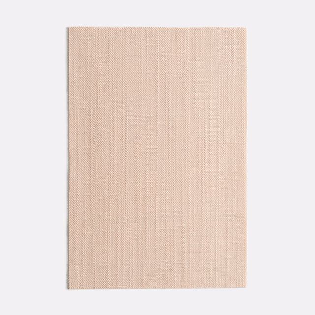 Pale powder-rose fabric with a fine, subtly ribbed vertical weave