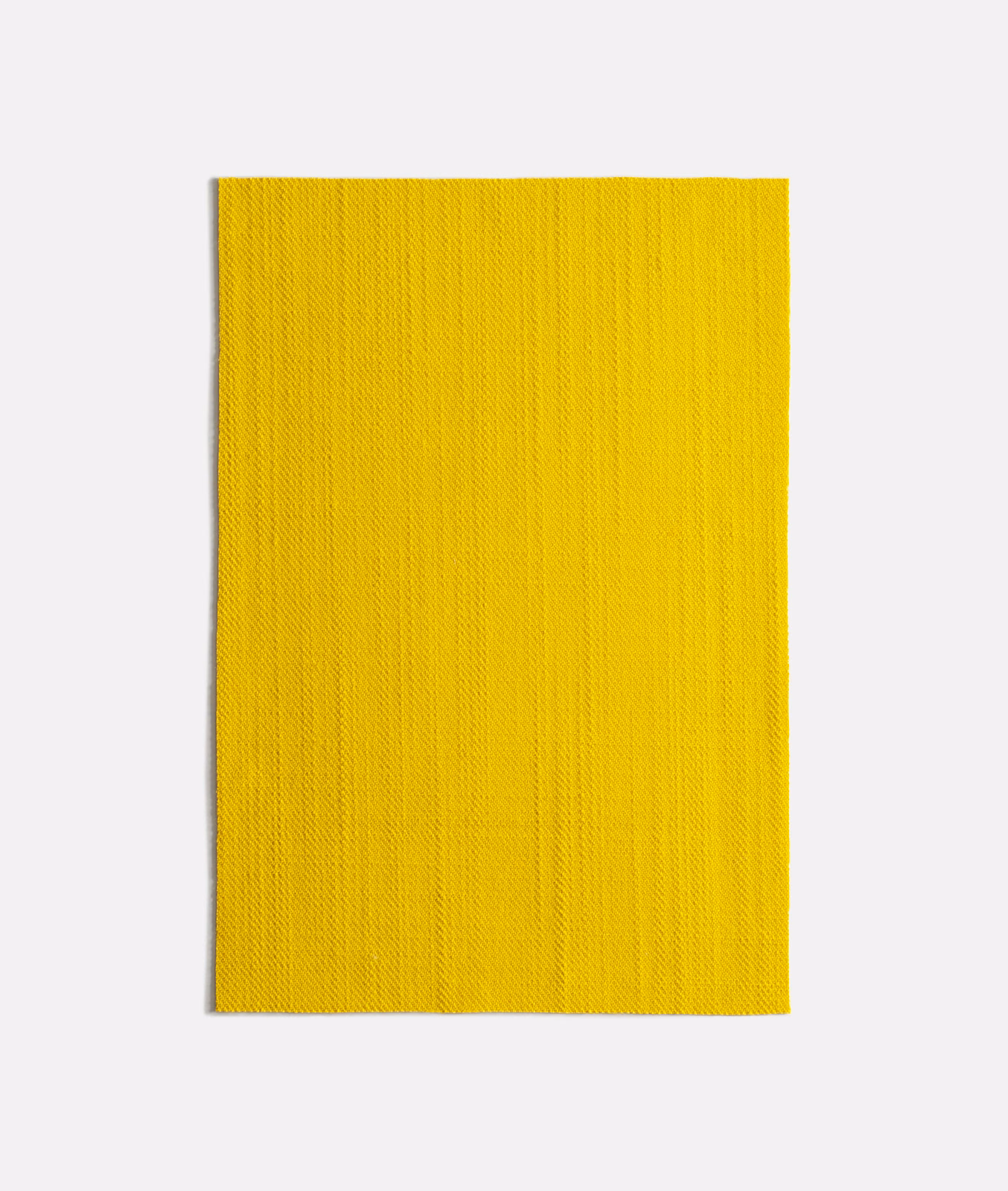 Vivid sulphur-yellow woven swatch with fine vertical chevron texture