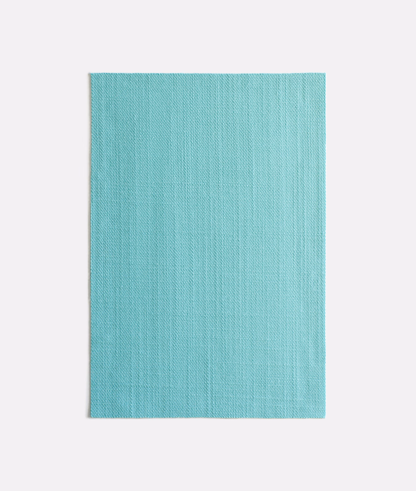 Cool turquoise woven textile with a subtle vertical, finely ridged surface