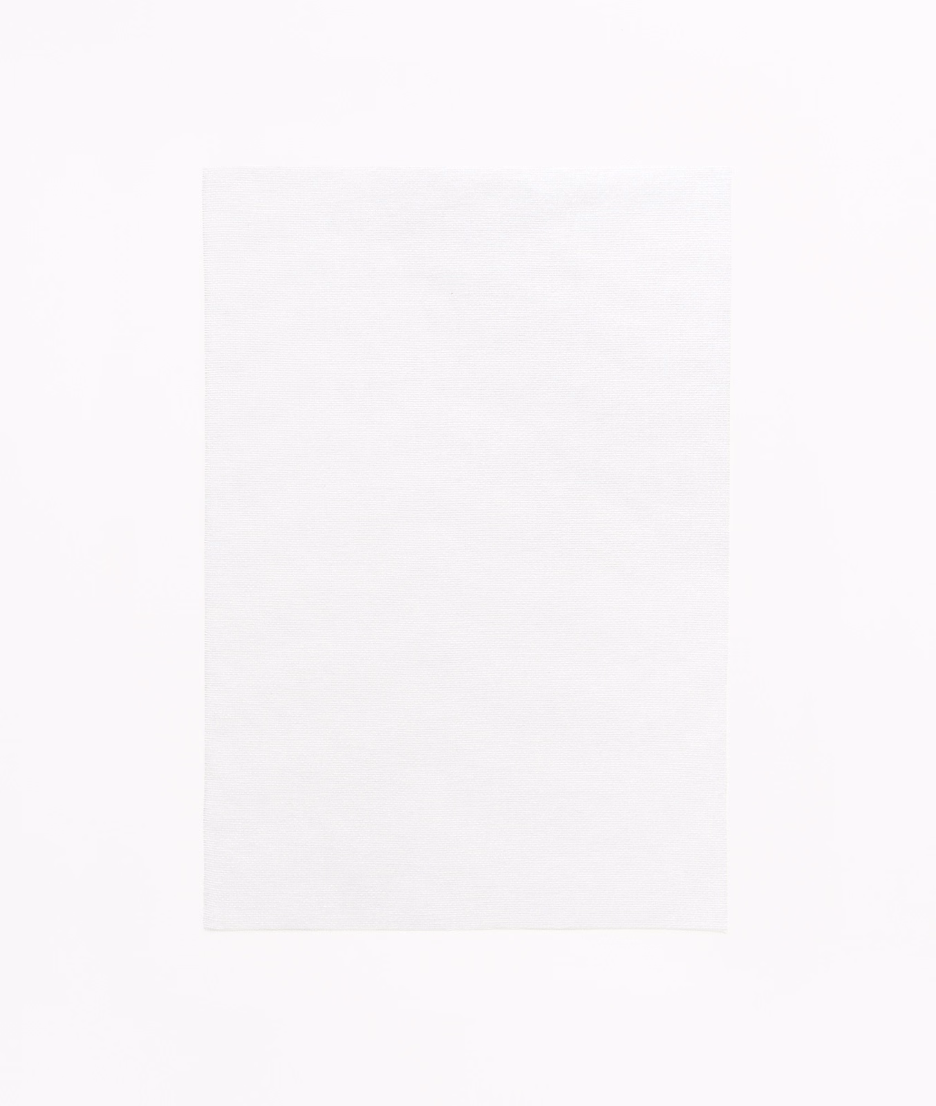 Near-white Bianco swatch with a barely visible, fine woven surface.