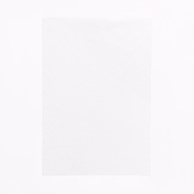 Near-white Bianco swatch with a barely visible, fine woven surface.