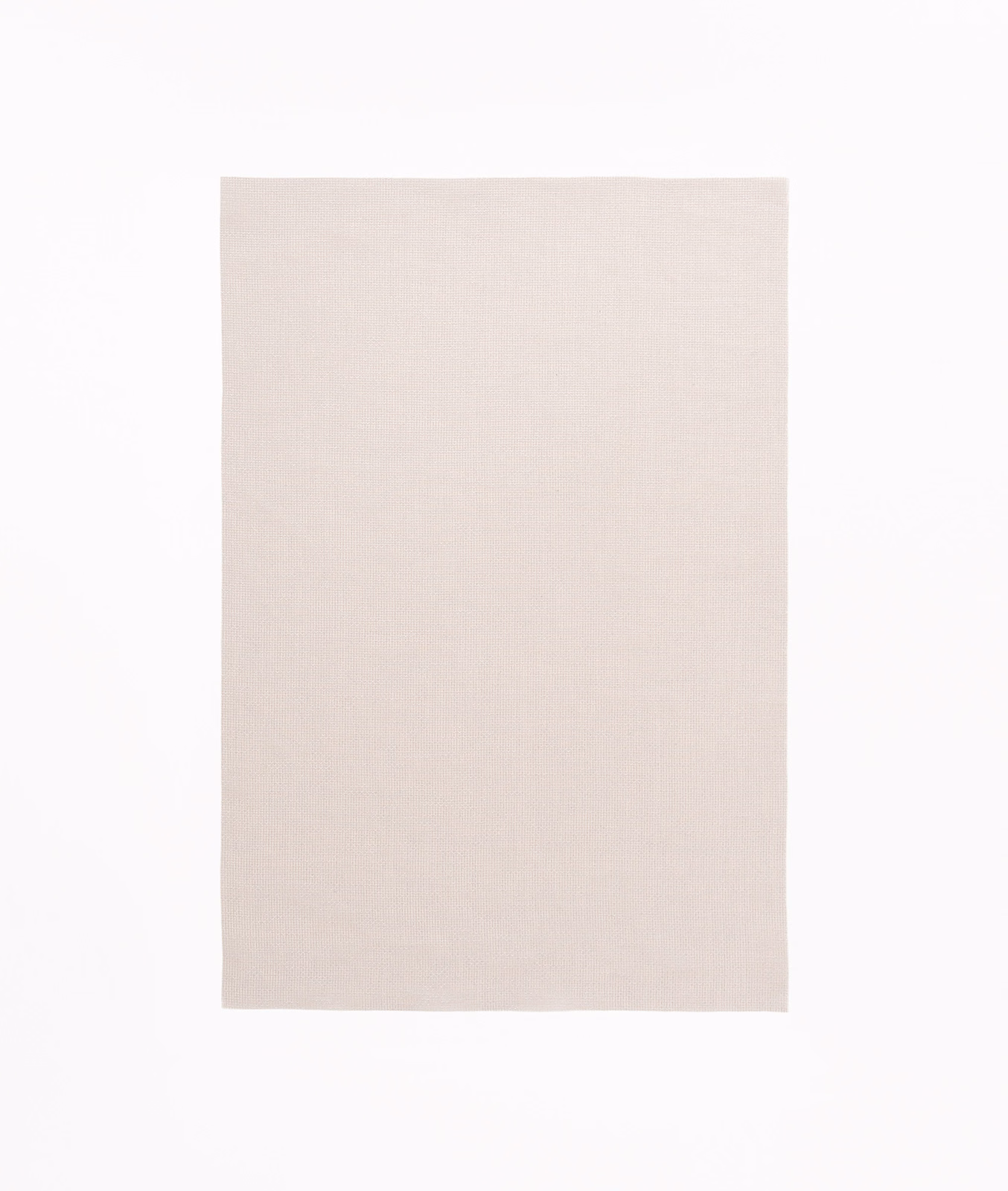 Pale warm greige swatch showing a fine, even textile weave