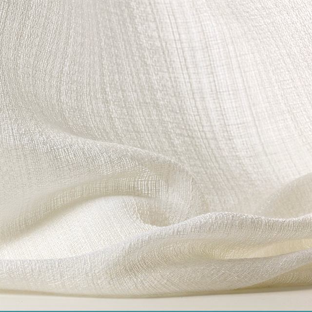 Warm ivory Weave Bianco textile with fine gauze weave gathered into soft folds