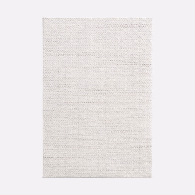 Pale silver-grey fabric swatch with a fine chevron geometric woven texture