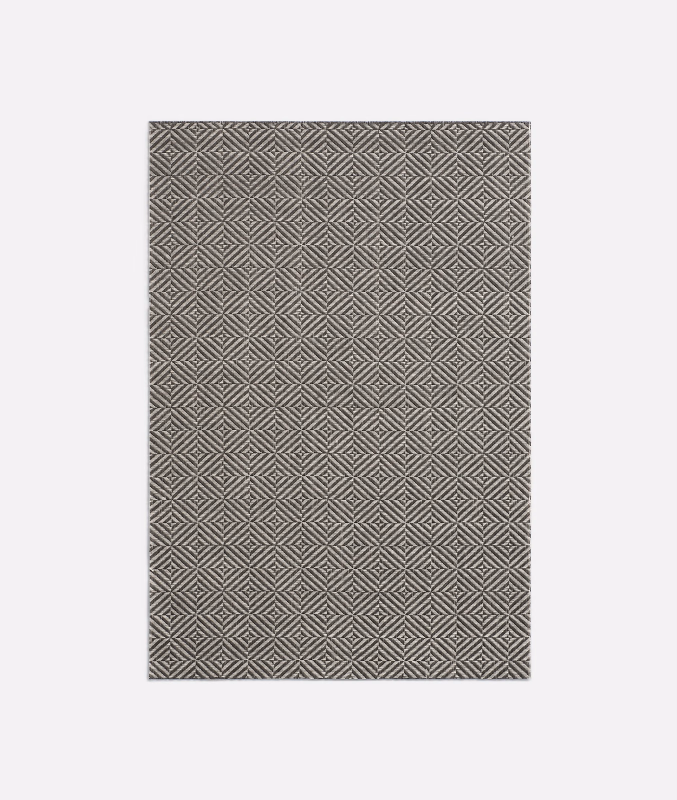 Charcoal-grey woven swatch with repeating small diamond and chevron motifs