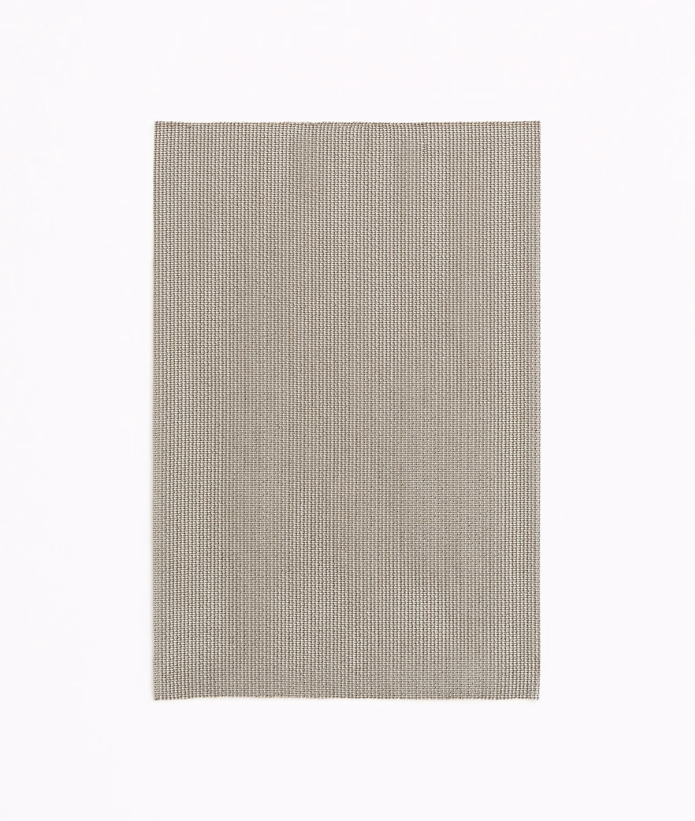 Pale greige Ardesia textile showing a fine, even vertical ribbed weave
