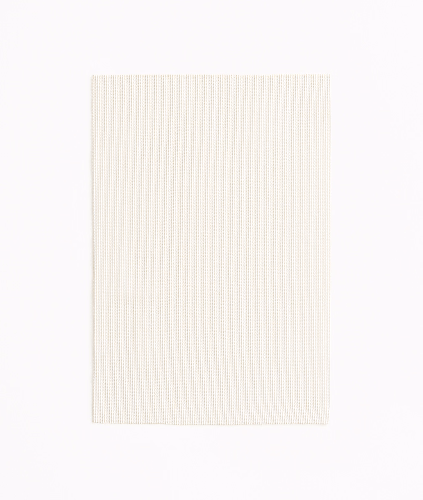 Warm ivory fabric swatch with fine, closely spaced vertical ribbing
