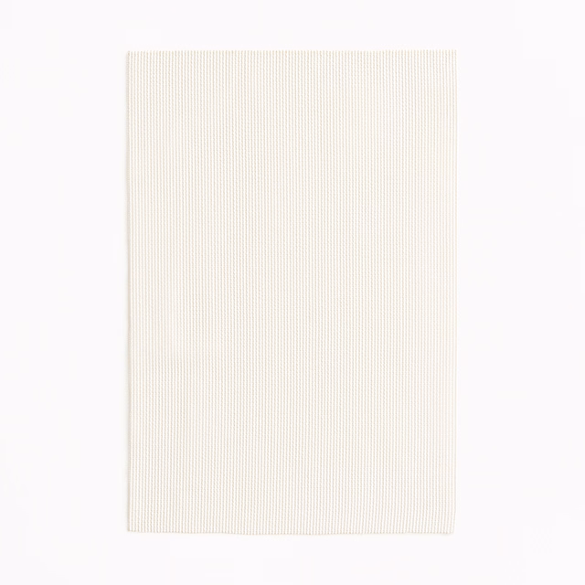 Warm ivory fabric swatch with fine, closely spaced vertical ribbing