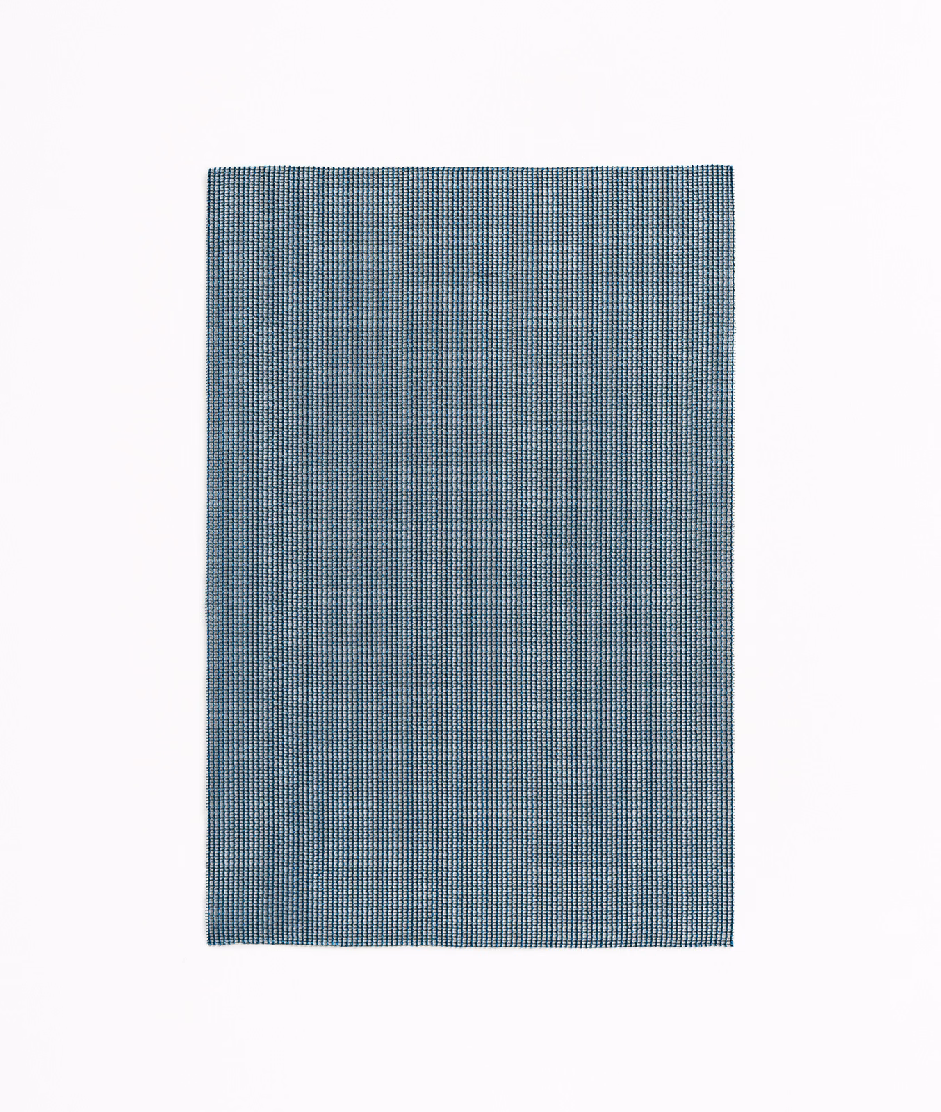 Muted petrol-blue textile with a fine, closely ribbed vertical weave
