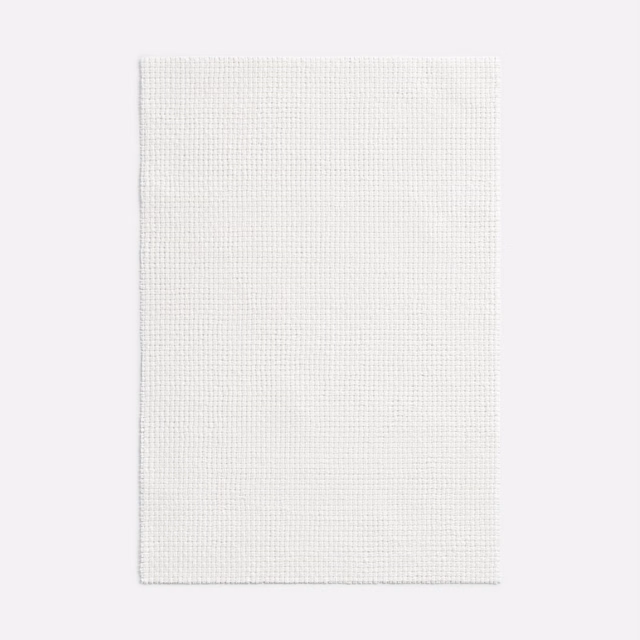 Pale latte cream fabric with a fine, evenly spaced woven grid