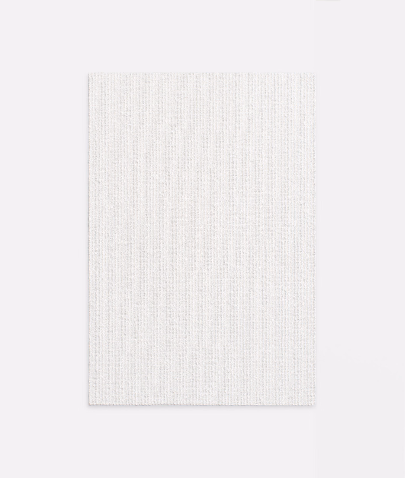 Ivory-white fabric swatch with fine vertical ribbed texture and softly warm tone