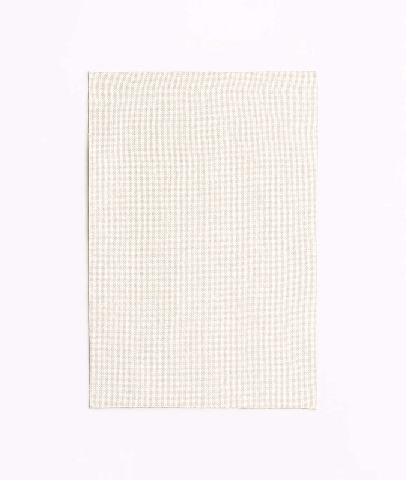 Close view of Amaral Avorio’s ivory surface and fine, even woven texture