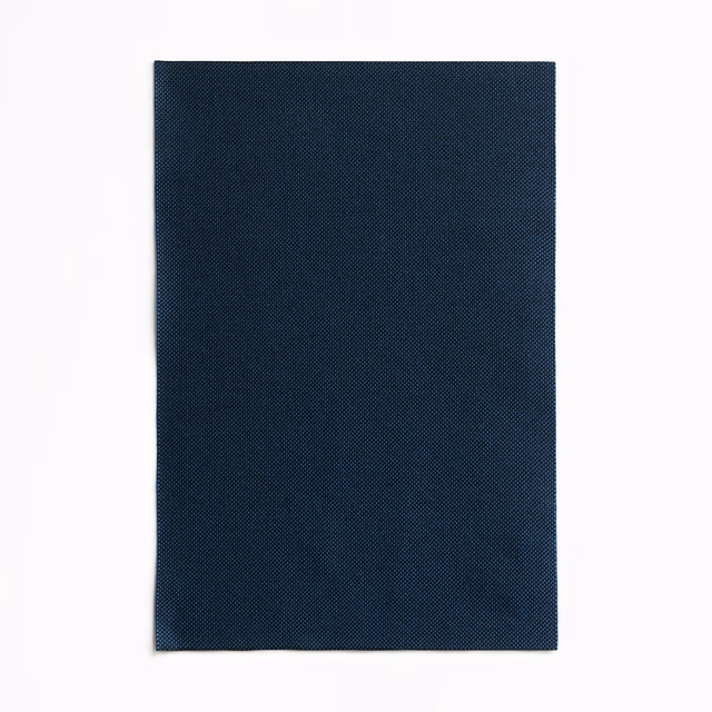 Deep ink-blue outdoor fabric swatch with a fine diagonal woven texture
