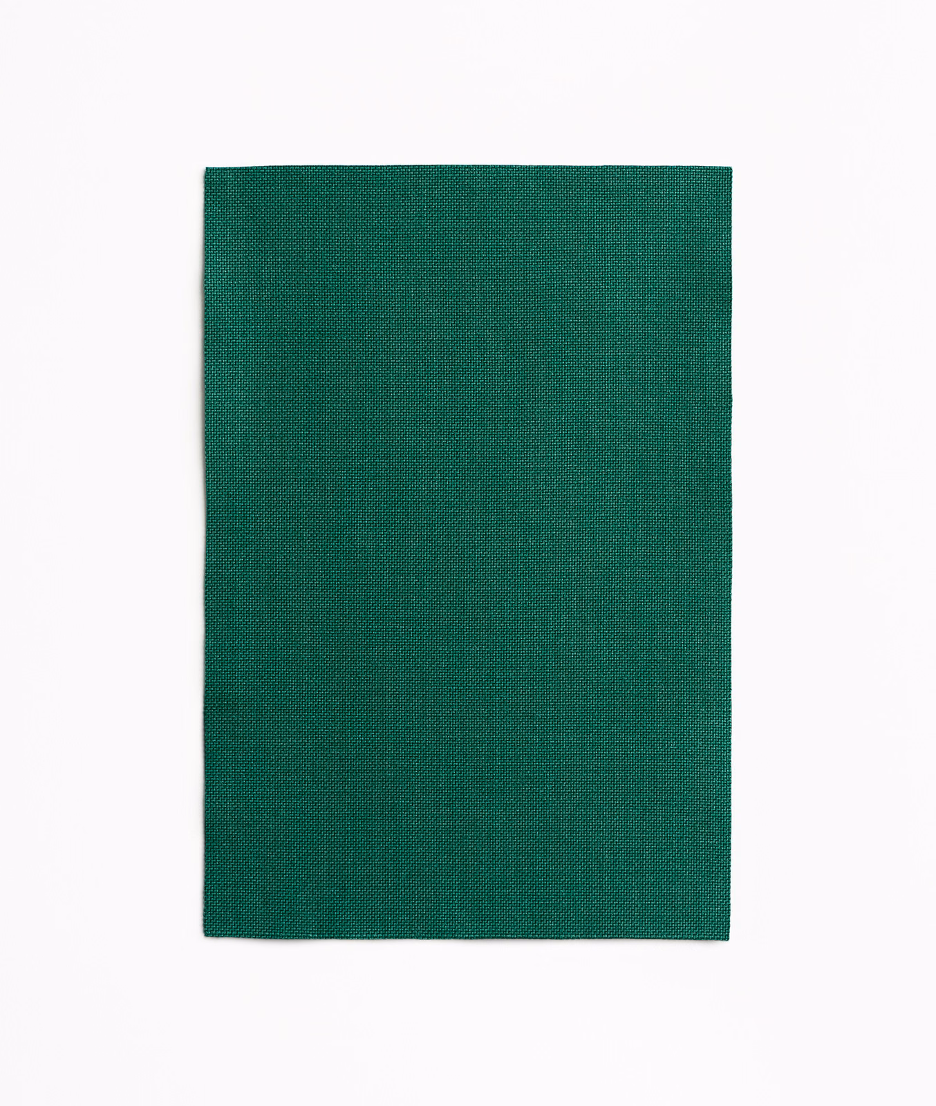 Deep forest-green outdoor textile with a finely grained, tightly woven surface.