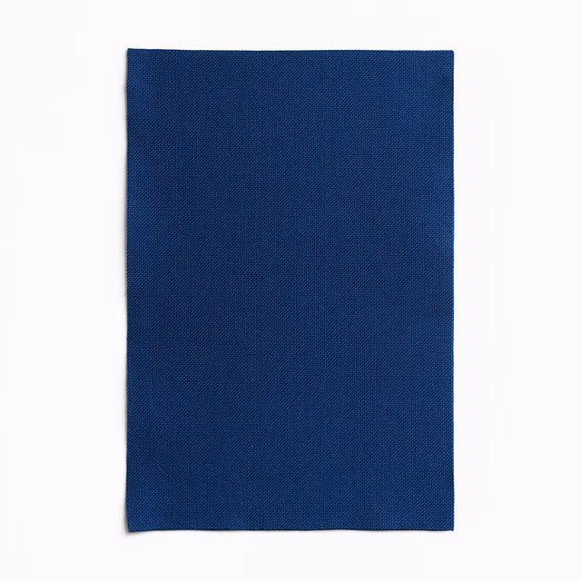 Deep navy outdoor textile swatch with a fine, subtly ridged woven texture