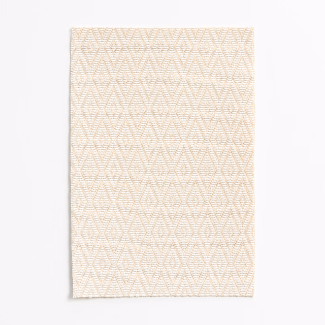 Warm ivory woven swatch with fine beige zigzag rows and soft texture