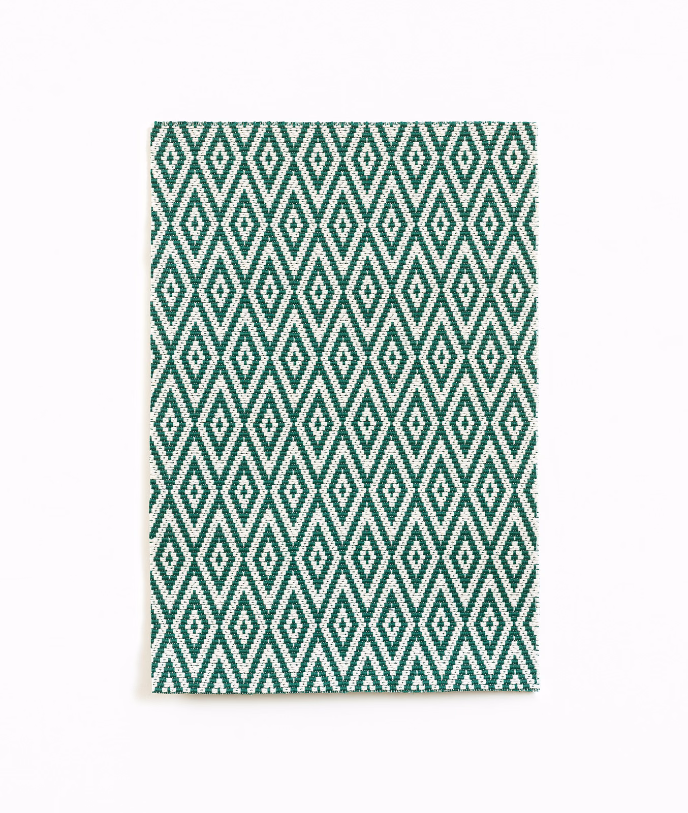 Forest-green and ivory woven fabric with a repeating nested diamond lattice