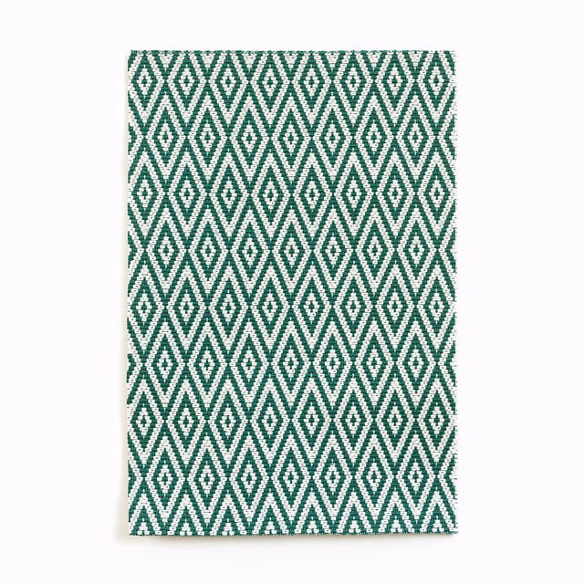 Forest-green and ivory woven fabric with a repeating nested diamond lattice