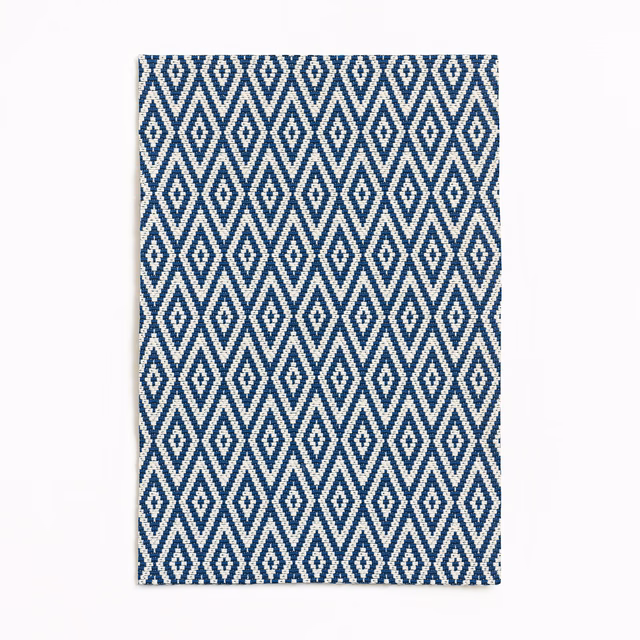 Deep navy and cream woven diamonds and chevrons on a rectangular swatch