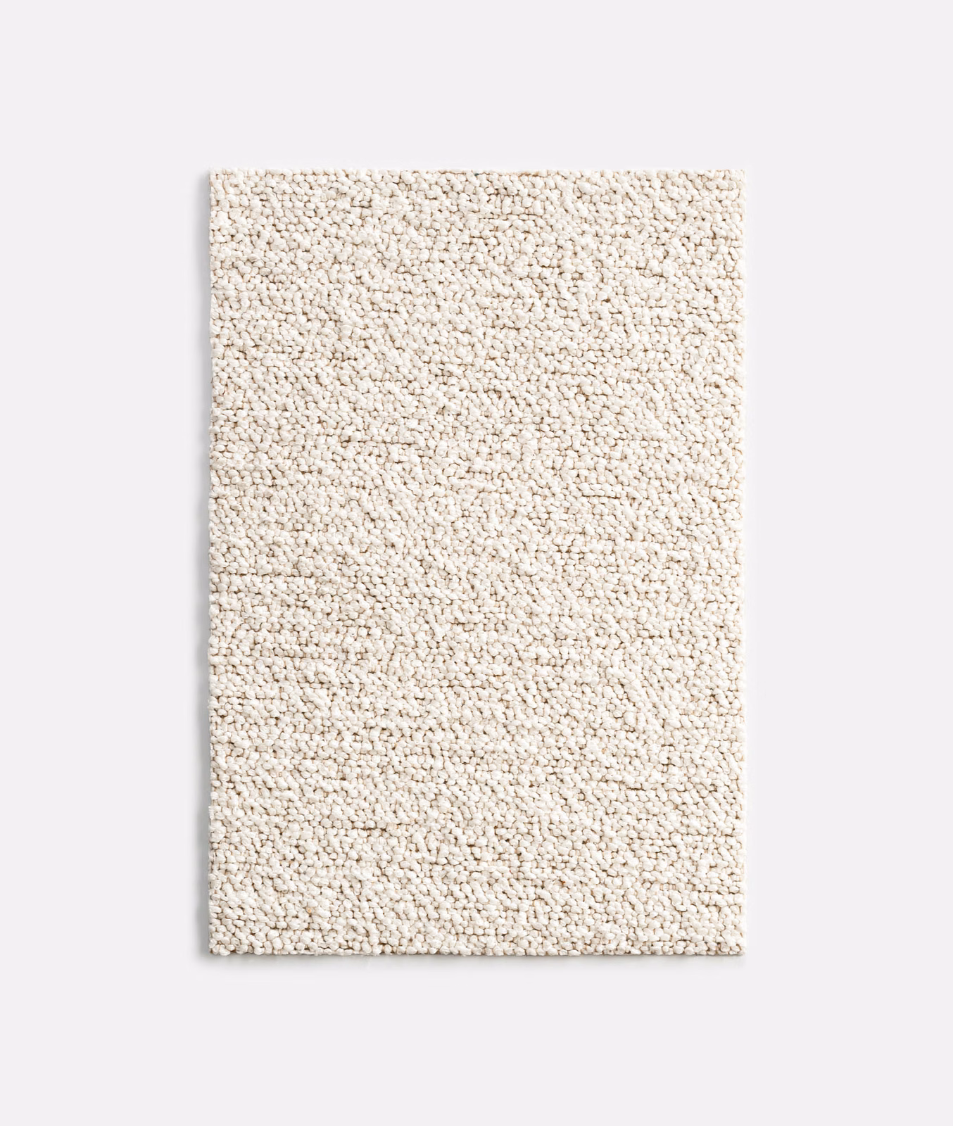 Warm ivory nubby outdoor textile with a dense, softly flecked woven surface