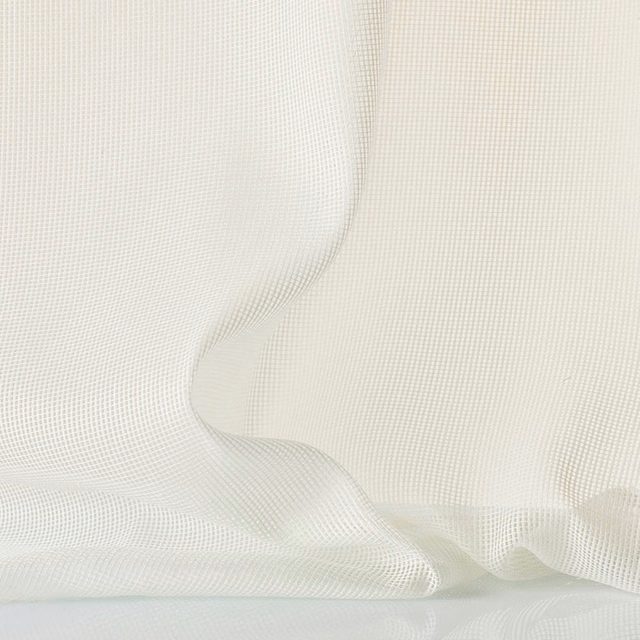 Pale ivory open-grid mesh draped in soft folds, showing a delicate translucent texture