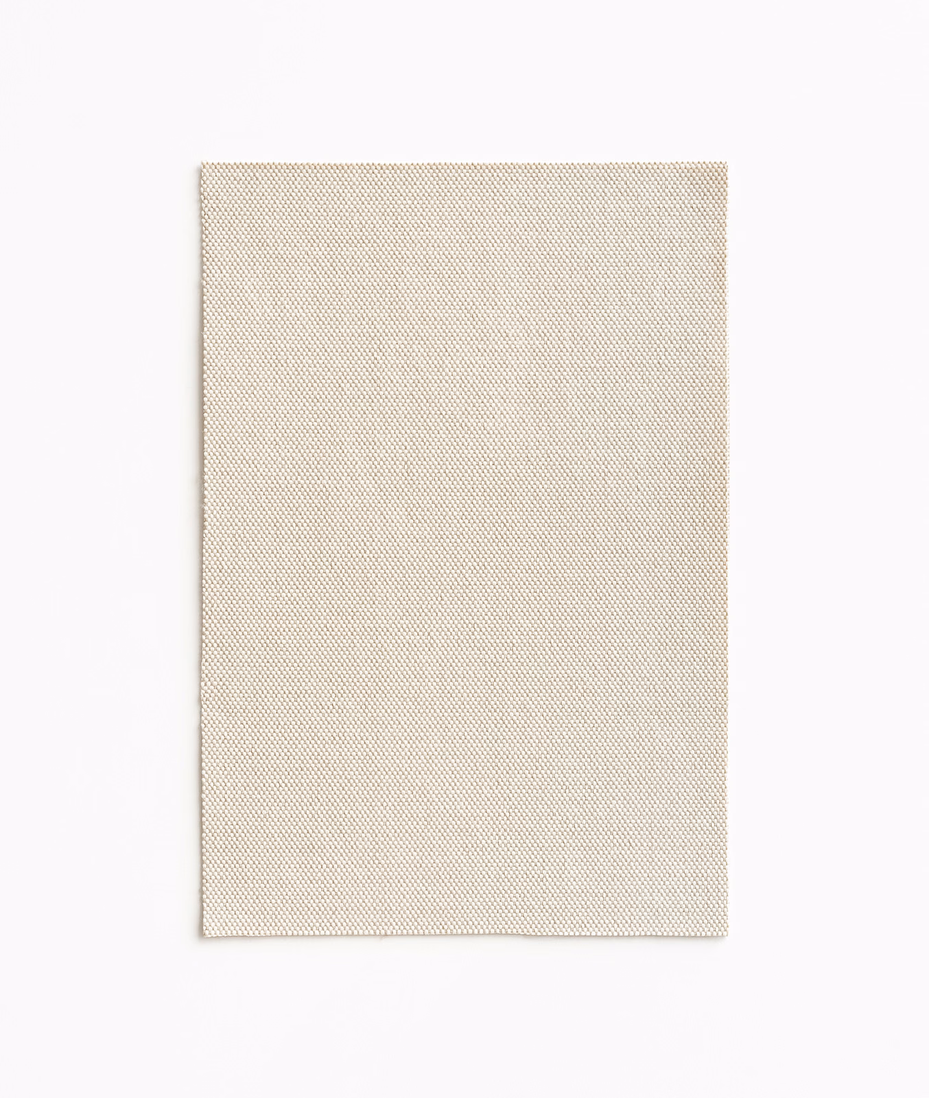 Warm beige outdoor weave with a minute diagonal, speckled texture