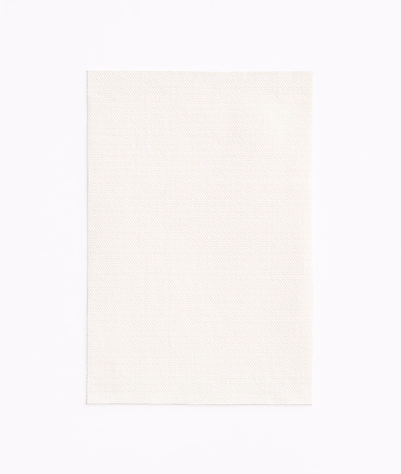 Soft ivory outdoor fabric swatch with a fine, subtly textured woven surface