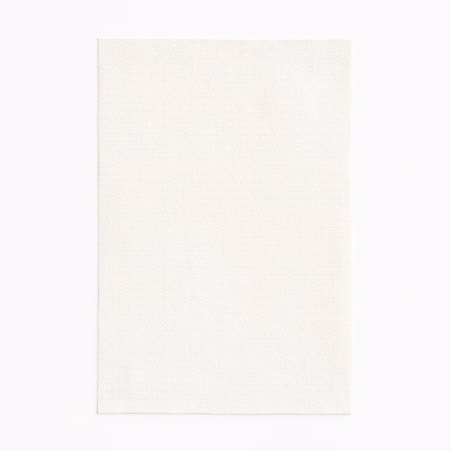 Soft ivory outdoor fabric swatch with a fine, subtly textured woven surface