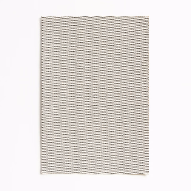 Warm taupe-grey outdoor textile with a fine black micro-chevron weave