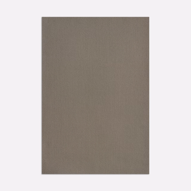 Close-up of taupe-grey Farniente fabric with a fine, tightly woven surface