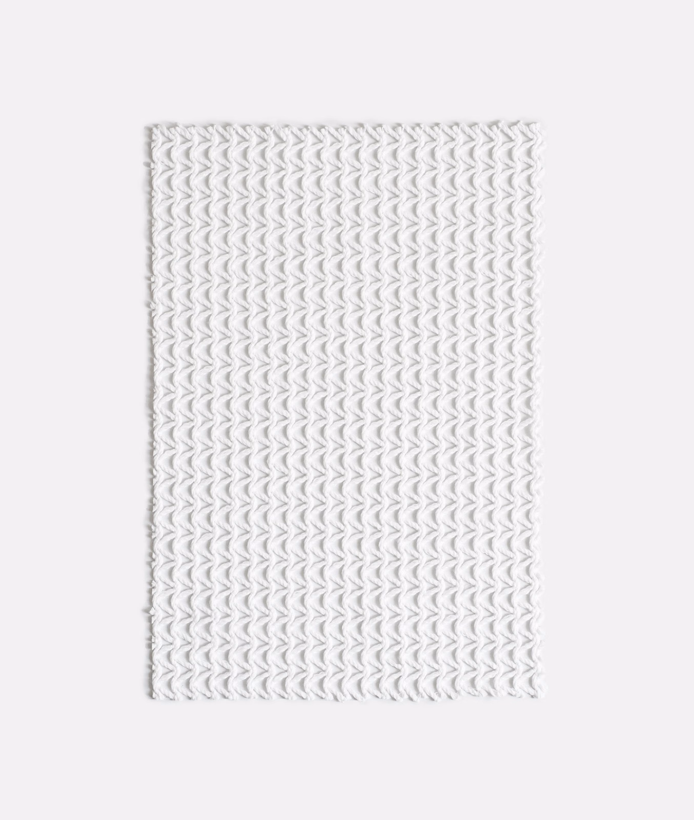 Cool white outdoor fabric with a small repeated chevron texture and soft grey woven shadows