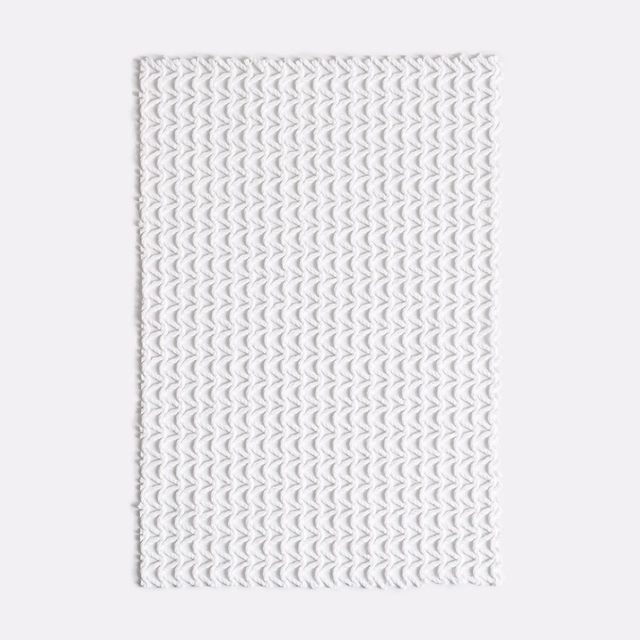 Cool white outdoor fabric with a small repeated chevron texture and soft grey woven shadows